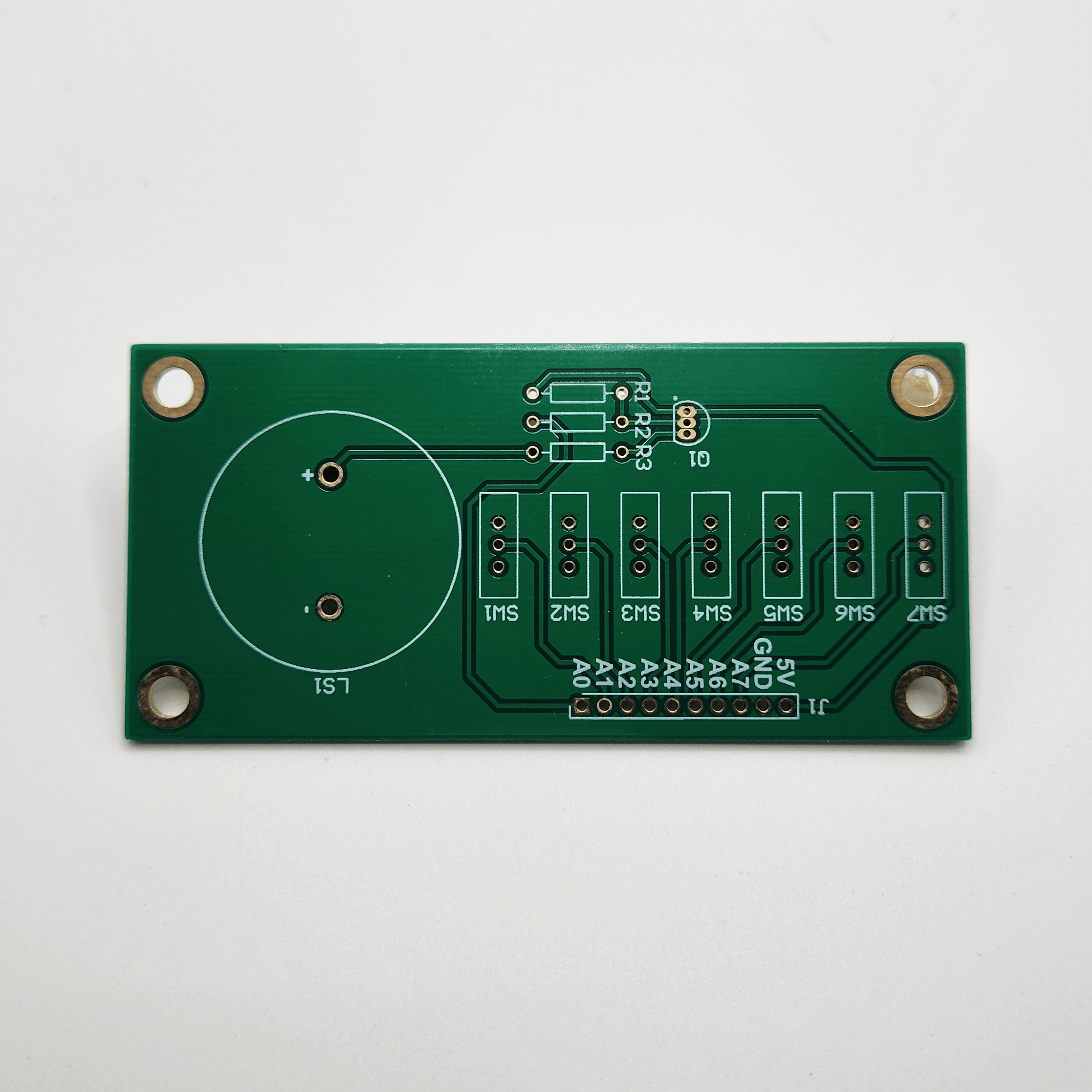 Front of unpopulated Simple Switch and Speaker Demo Board v1 PCB