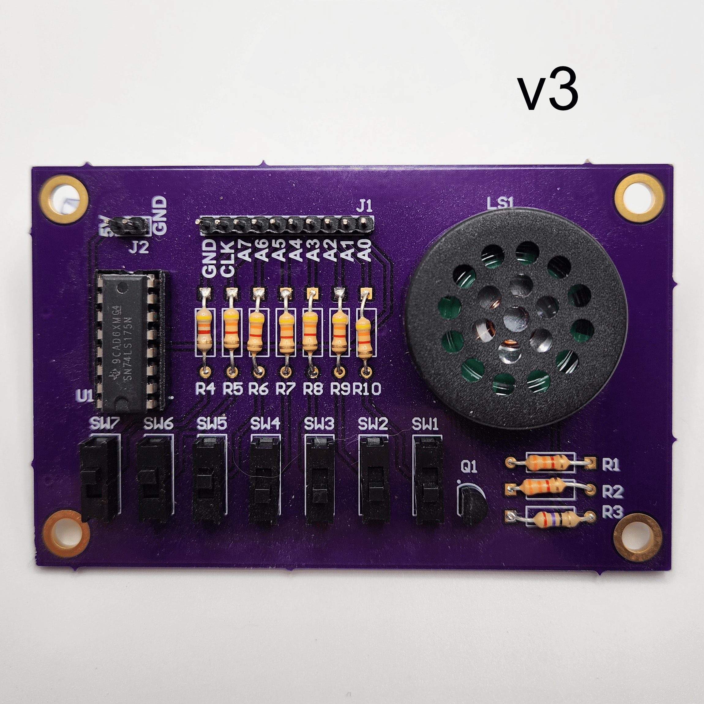 Complete populated Simple Switch and Speaker Demo Board v3 PCB with a text label indicating what version board it is