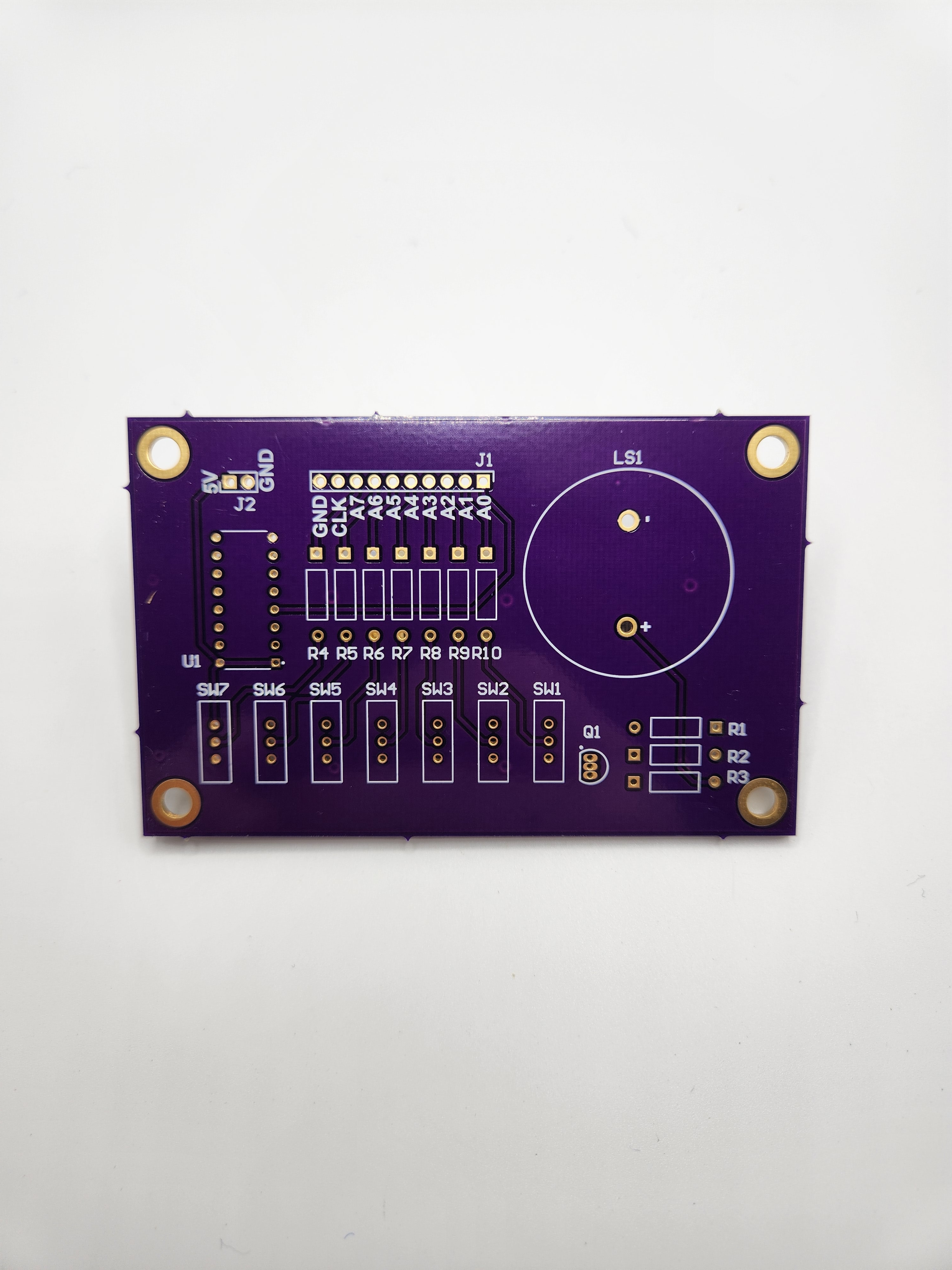 Front of unpopulated Simple Speaker and Switch Demo Board PCB